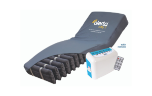 Alternating Air Mattress with pump and remote control. Section cut out in bottom right corner to reveal the cells within.