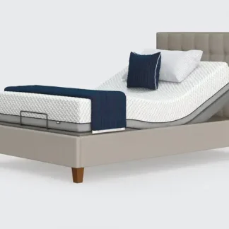 Opera Flyte Adjustable Bed with white background. Head and leg sections elevated. On legs for clearance underneath