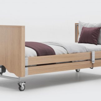 Opera Classic Profiling Bed - flat with enclosed bed ends in Oak with white and purple bedding.