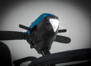 LED Light on on the front of the controls of the Lithilite Pro Mobility Scooter