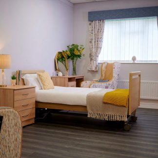 Harvest Cadence Comfort Profiling Bed in room setting in flat position.