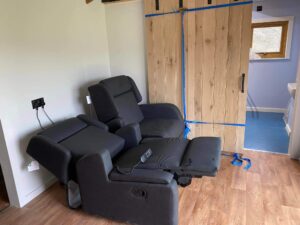 Holidays for Disabled People - 2 Havant Riser Recliners in Black with drop arms for side transfers and holding hands