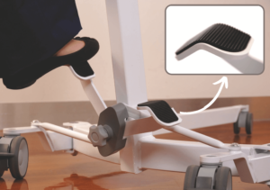 Foot Pedal Leg Adjustment - Oxford Hoists - a foot is a placed on the pedal to open the legs with a close up of the pedal in the top right corner 