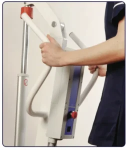 Nurse grasping the oversized push handle on the Oxford Classic Lift